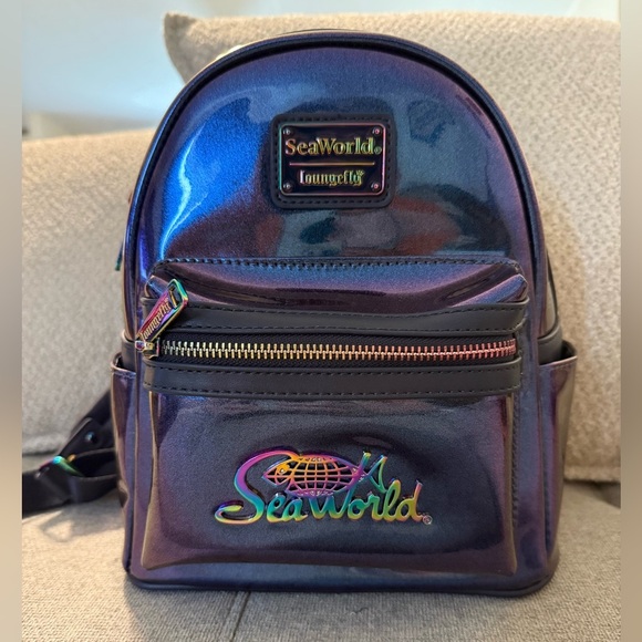 Loungefly SeaWorld Iridescent Purple Backpack - Picture 2 of 13